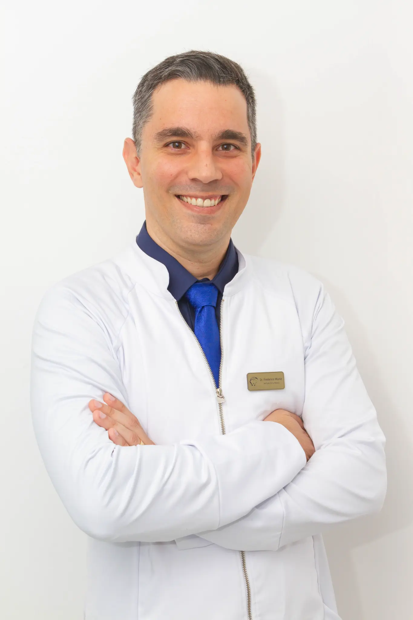 Dr. Frederico Muniz - Especialista em Implantes